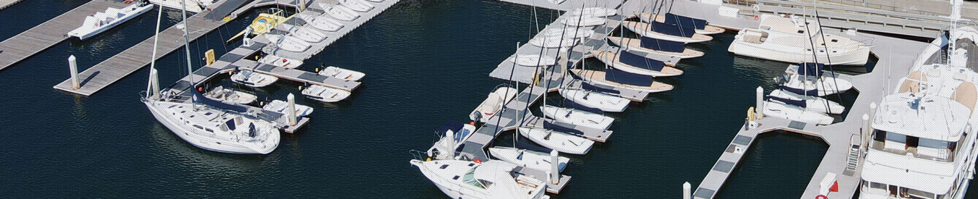 Aerial view of sailing boats docked at a pier